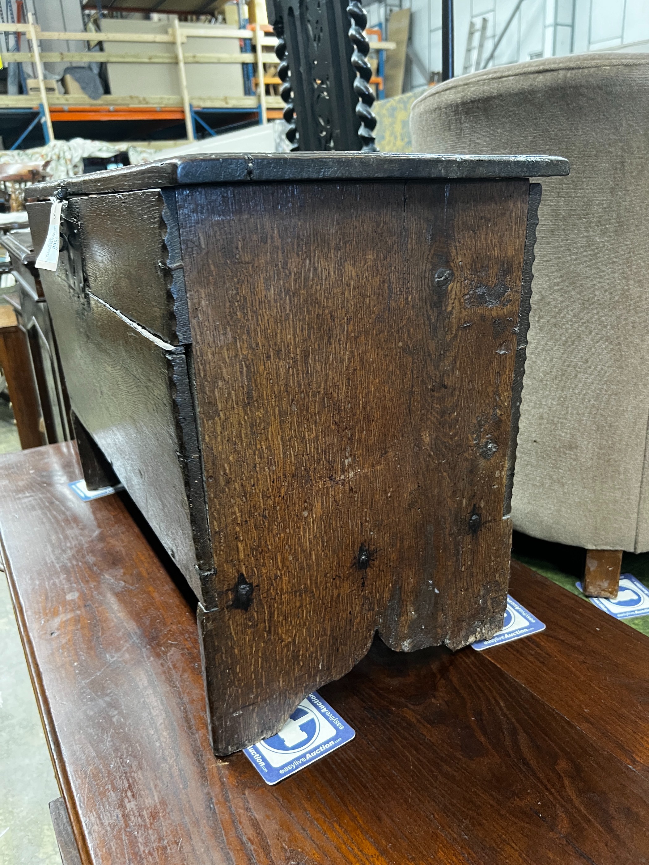 A late 17th century oak six plank coffer, length 73cm, depth 35cm, height 50cm